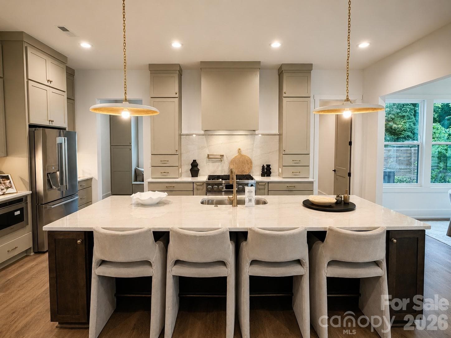 Gourmet kitchen with stacked cabinets - Charlotte