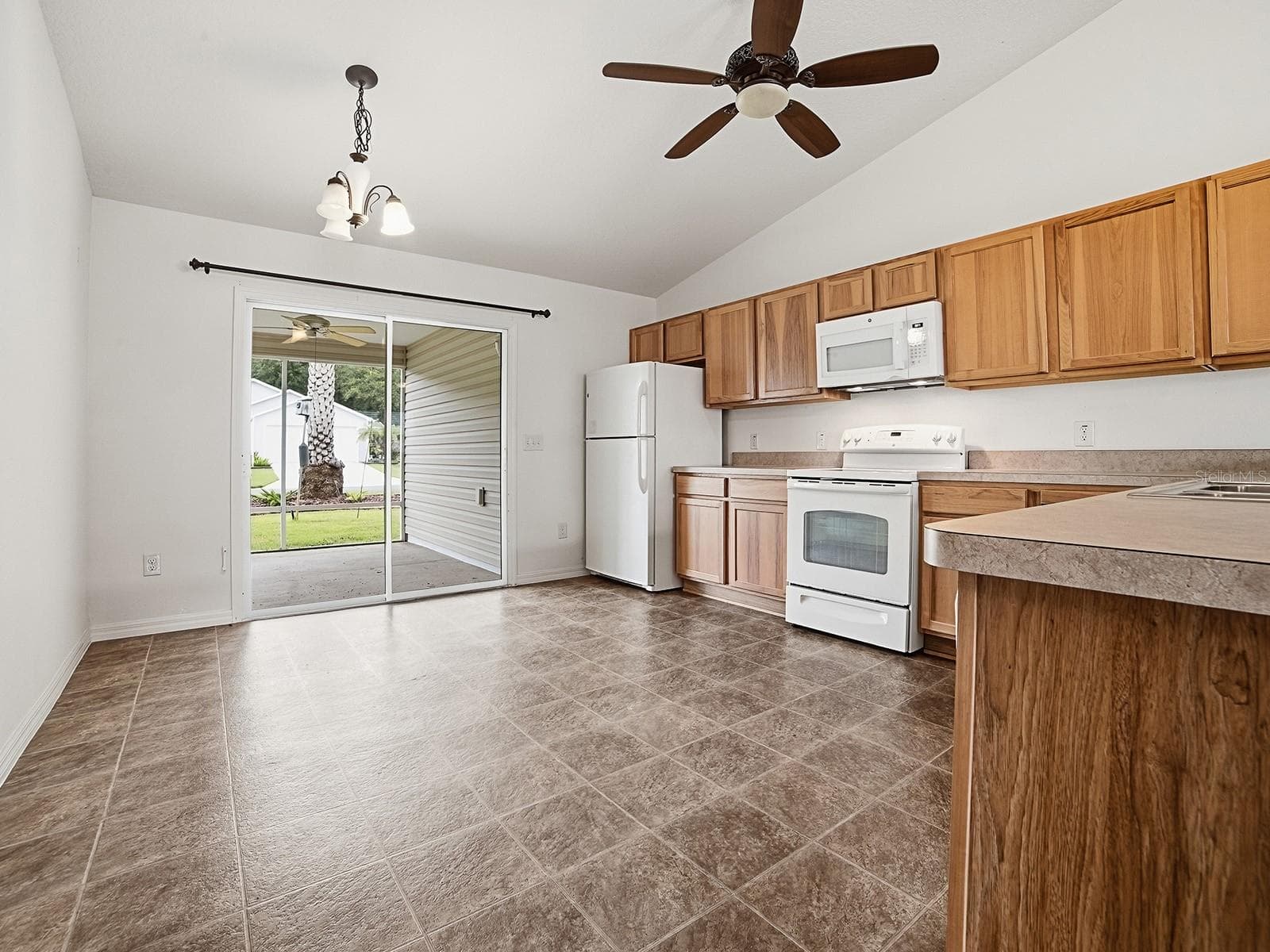Large Kitchen with Lanai. - 250 ARBELLA LOOP, THE VILLAGES