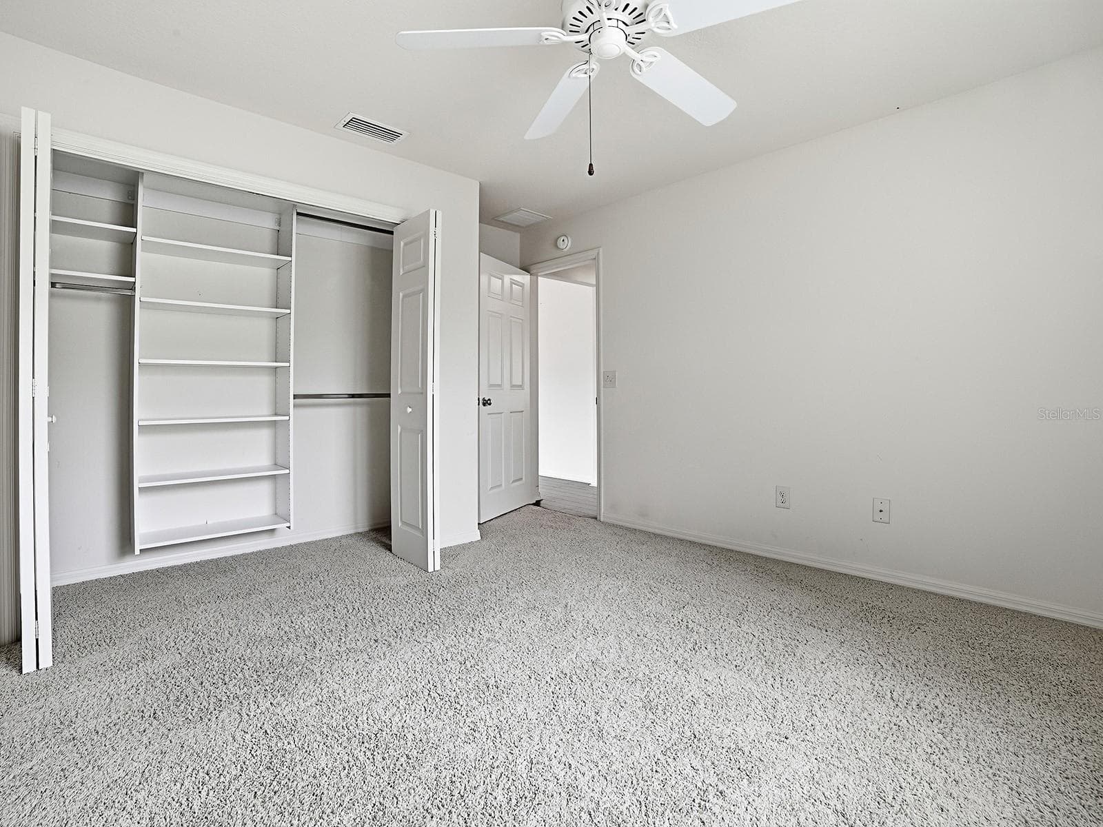 Bedroom 3 with Custom Closet System - 250 ARBELLA LOOP, THE VILLAGES