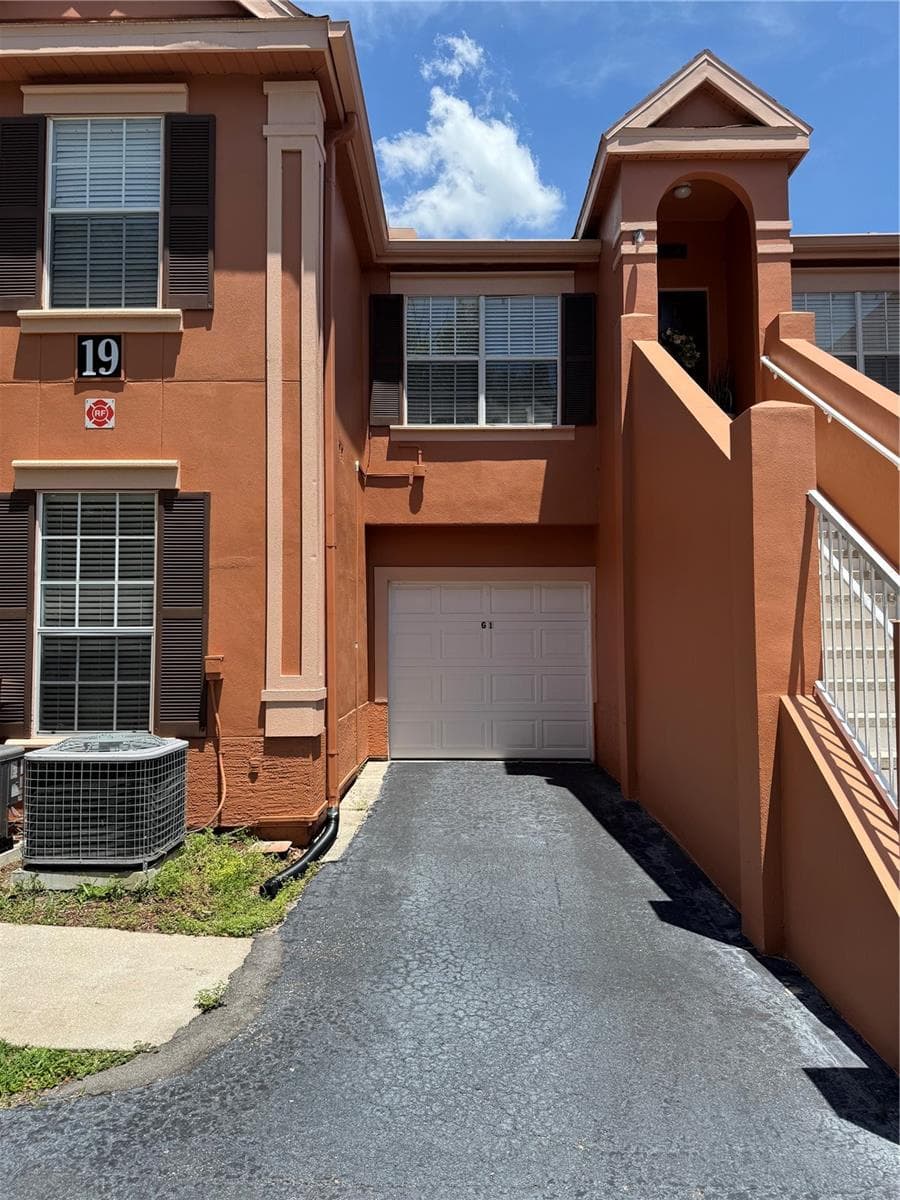 1 car garage at building 19 G1 - 9288 LAKE CHASE ISLAND WAY, TAMPA