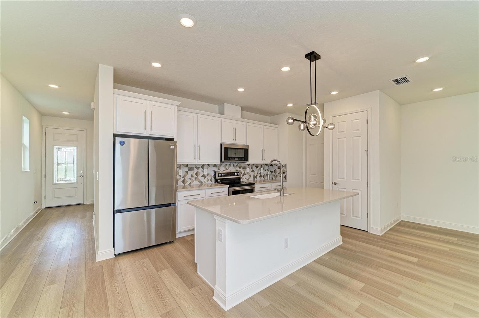 Awesome kitchen with quartz counters and a Brand New Refrigerator - 10455 WET MARSH CV, PARRISH
