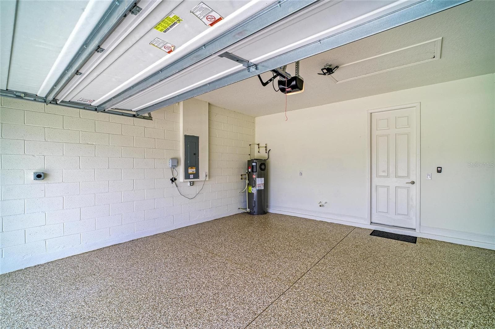Epoxy Garage Floor and 2 coutlets set up for Electric Car charging - 10455 WET MARSH CV, PARRISH
