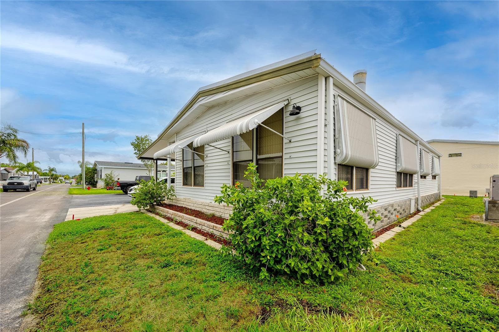 Manufactured Home at 6821 AMERICANA DR NE #106, ST PETERSBURG, photo 13 of 59