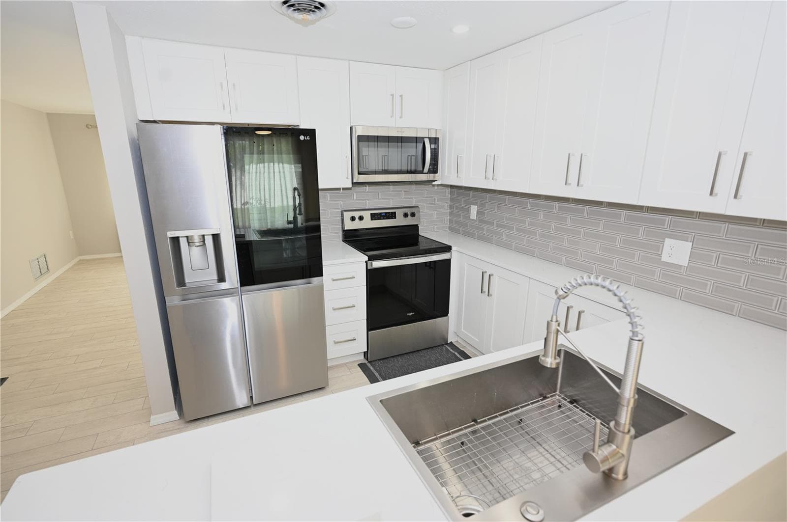 Updated kitchen, new appliances, cabinets, count4ers, tile - 1620 MORNING DOVE LN, ENGLEWOOD