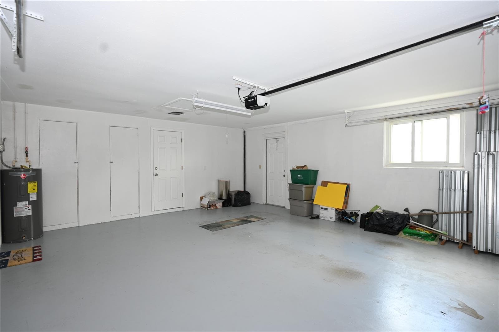 storage closets in garage - 1620 MORNING DOVE LN, ENGLEWOOD