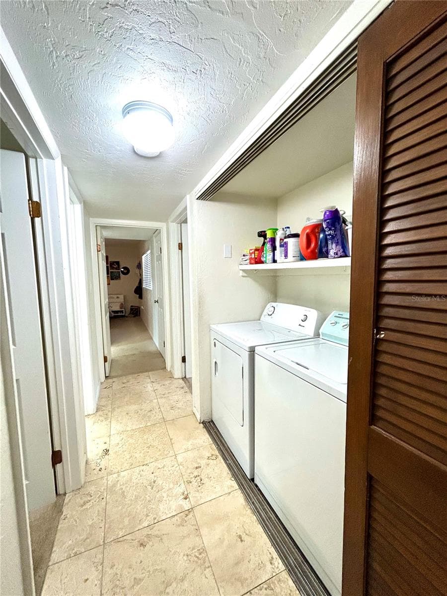 Laundry Closet in Hallway - 407 NW 39TH RD #407C, GAINESVILLE