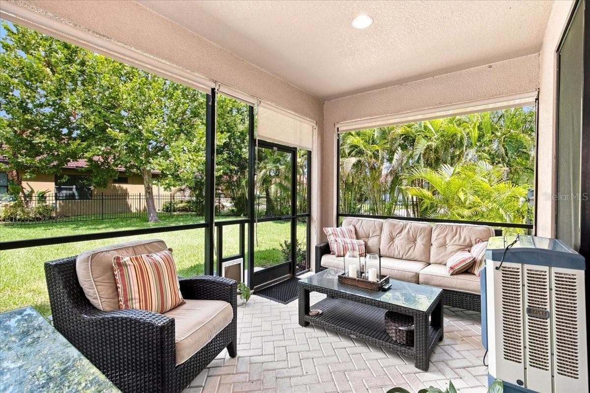 Screened in Lanai - 4508 GRAND LAKESIDE DR E, PALM HARBOR