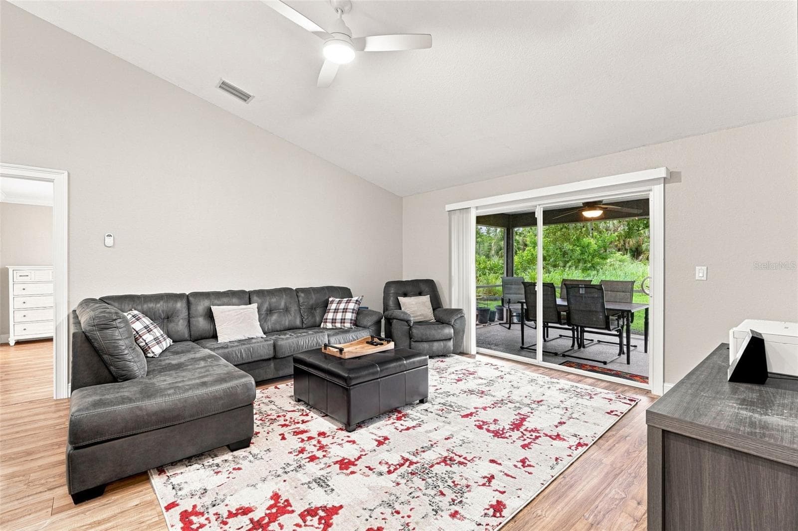 Family Room Features Indoor-Outdoor Flow - 3695 WAFFLE TER, NORTH PORT