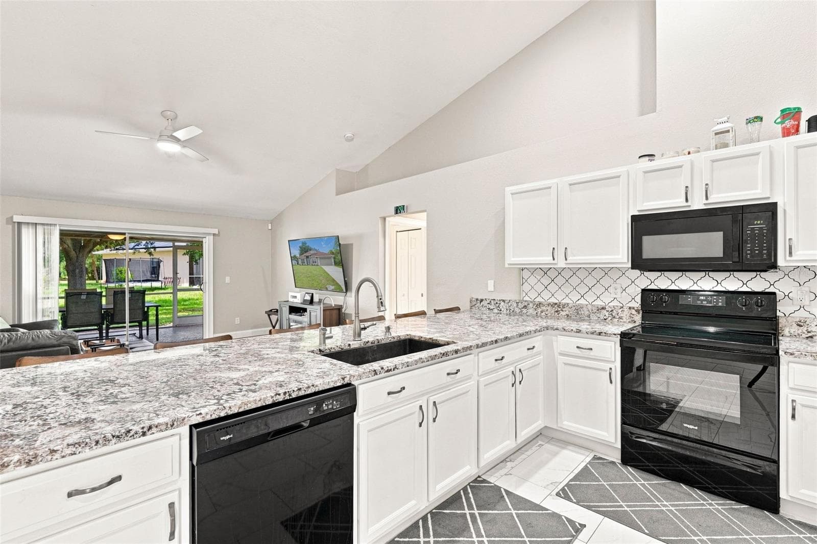 Abundant Cabinetry With Crafted Tile Backsplash - 3695 WAFFLE TER, NORTH PORT