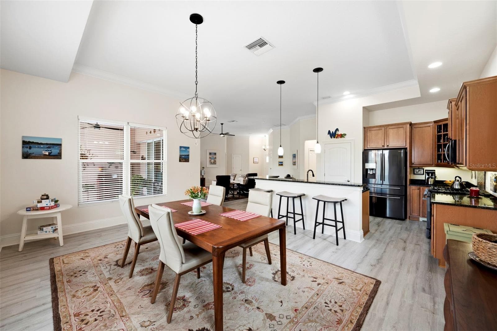The dining room features abundant natural light - 3850 CREEKSIDE PARK DR, PARRISH
