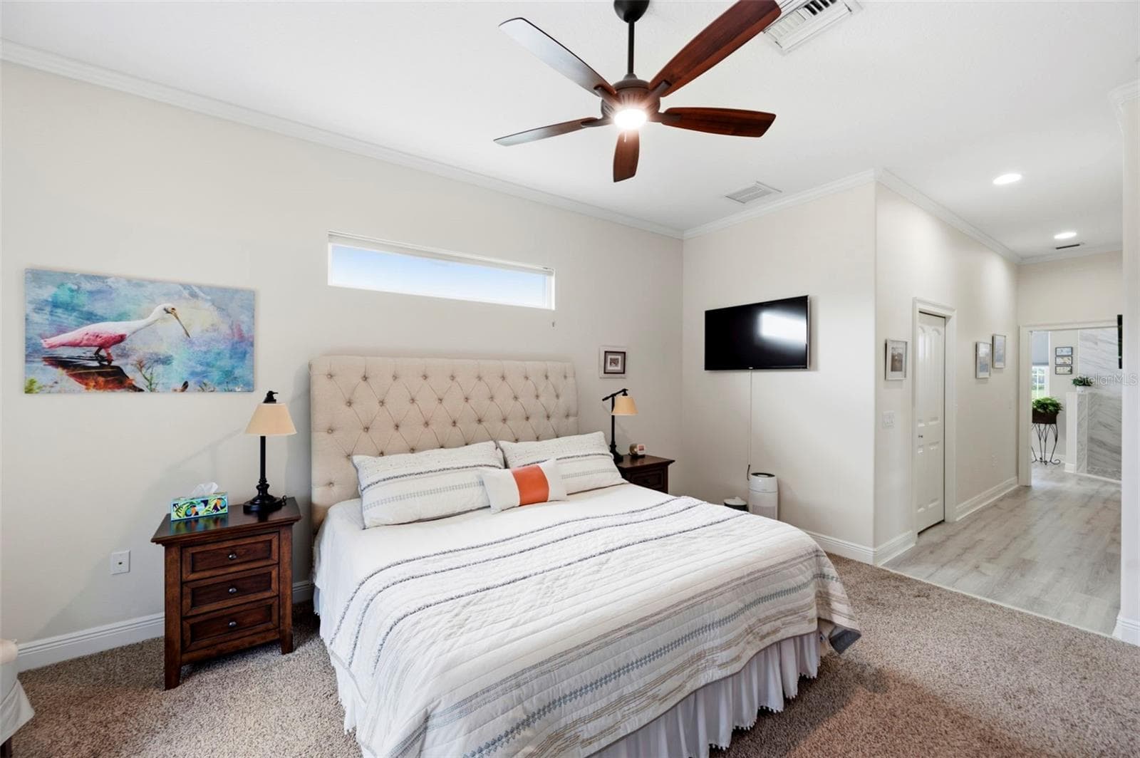 The primary suite wing runs from the front to the back of the home - 3850 CREEKSIDE PARK DR, PARRISH