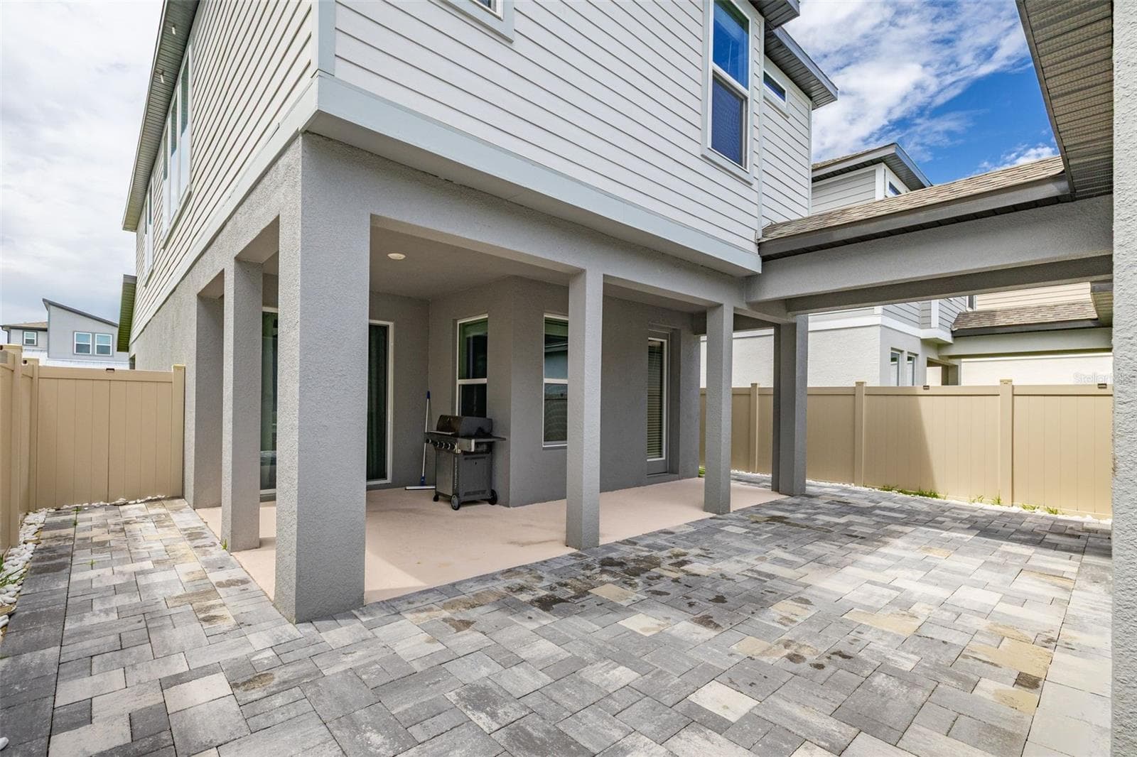paved and fenced backyard - 14099 FRASIER ST, WINTER GARDEN