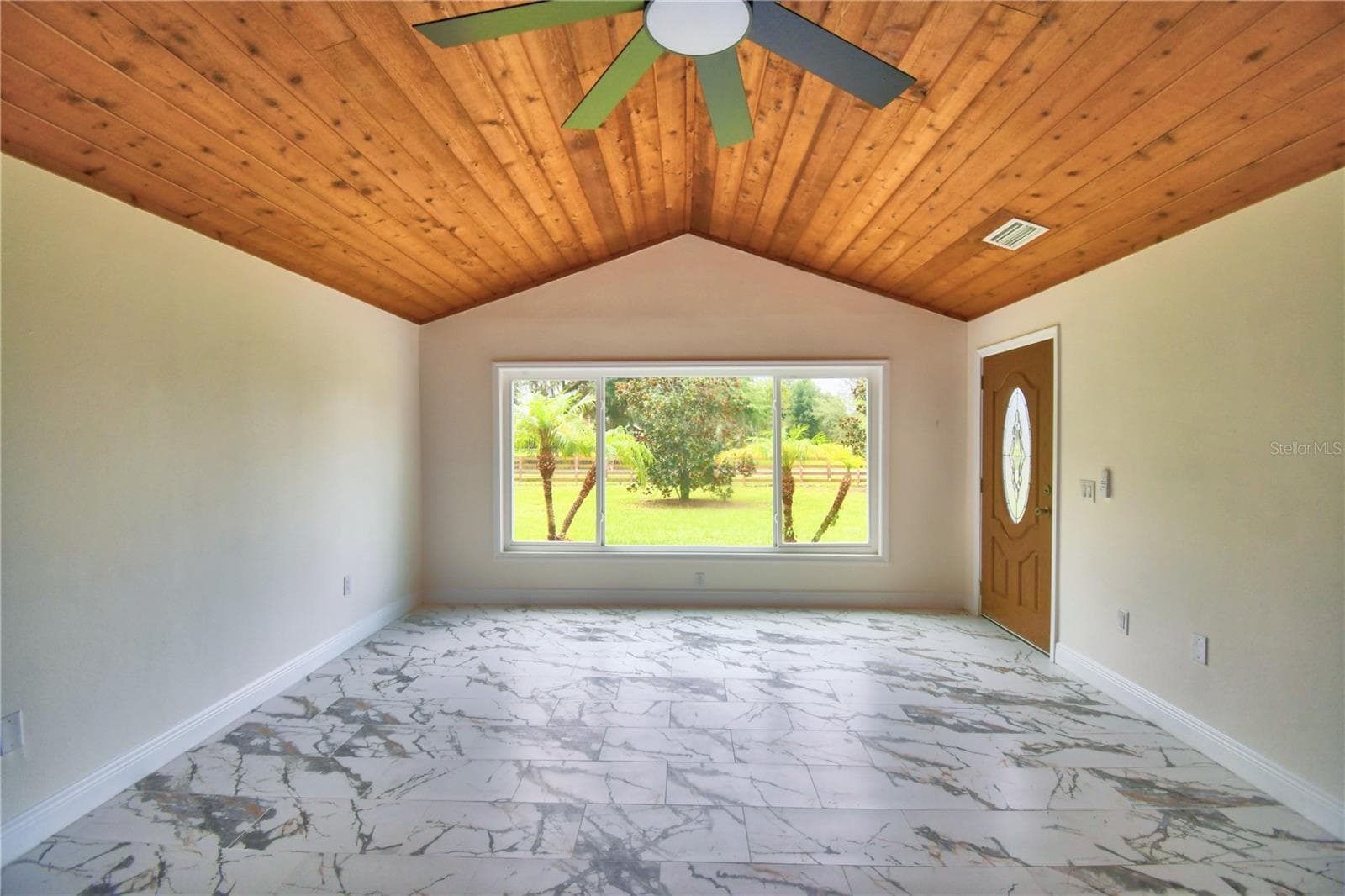 Living Room with huge front Window - 8704 TOM COSTINE RD, LAKELAND