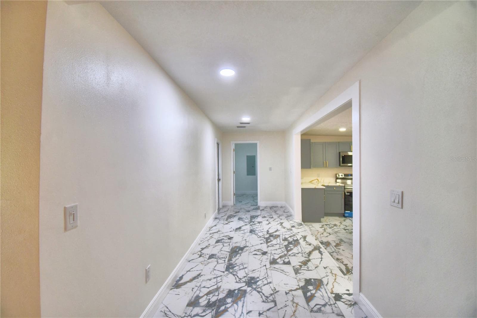 Enormous hallway to the garage/laundry room - 8704 TOM COSTINE RD, LAKELAND
