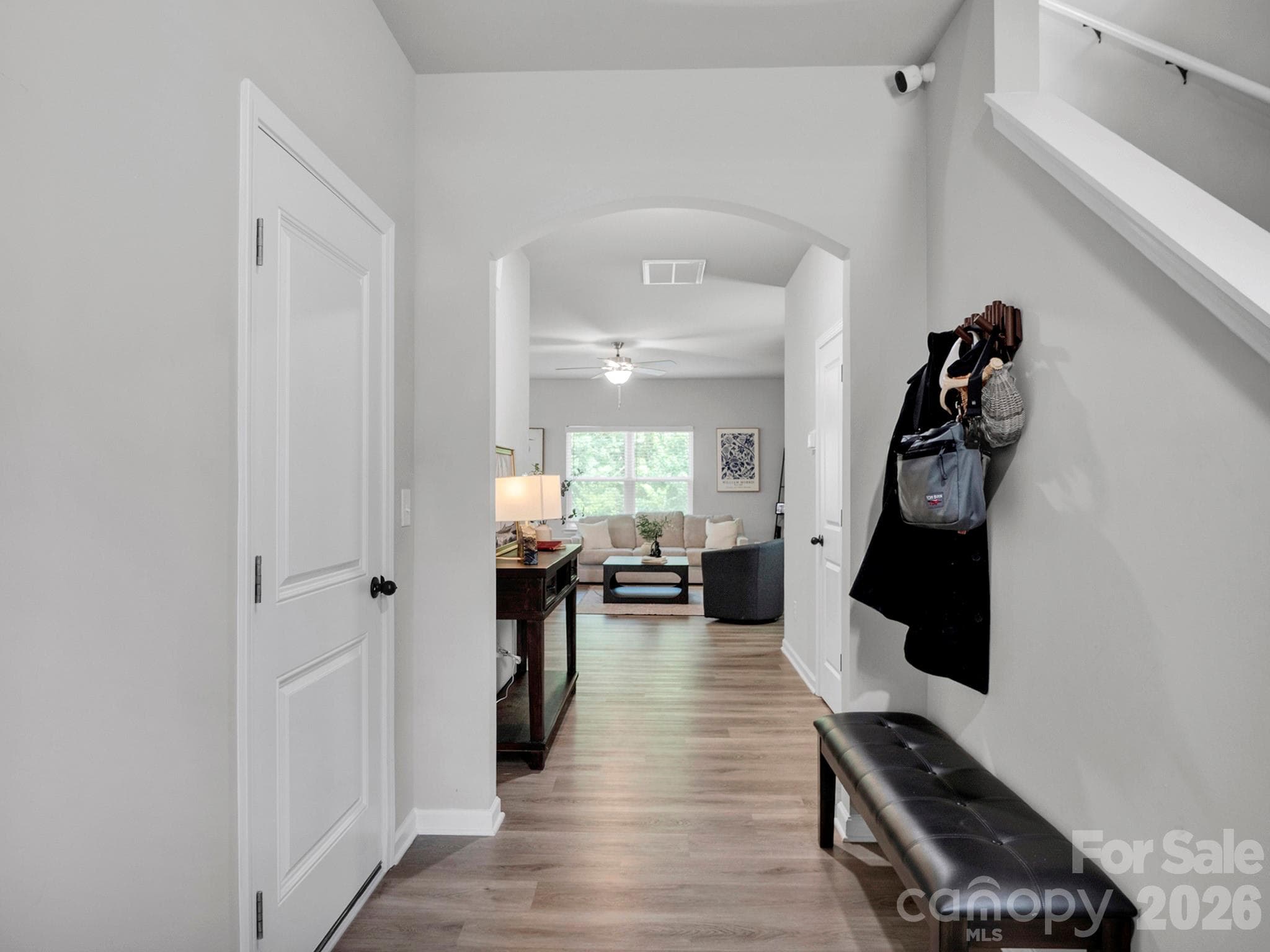 Entry way to the open floor-plan living with a two car garage. - 7203 Stoney Wood Lane, Charlotte