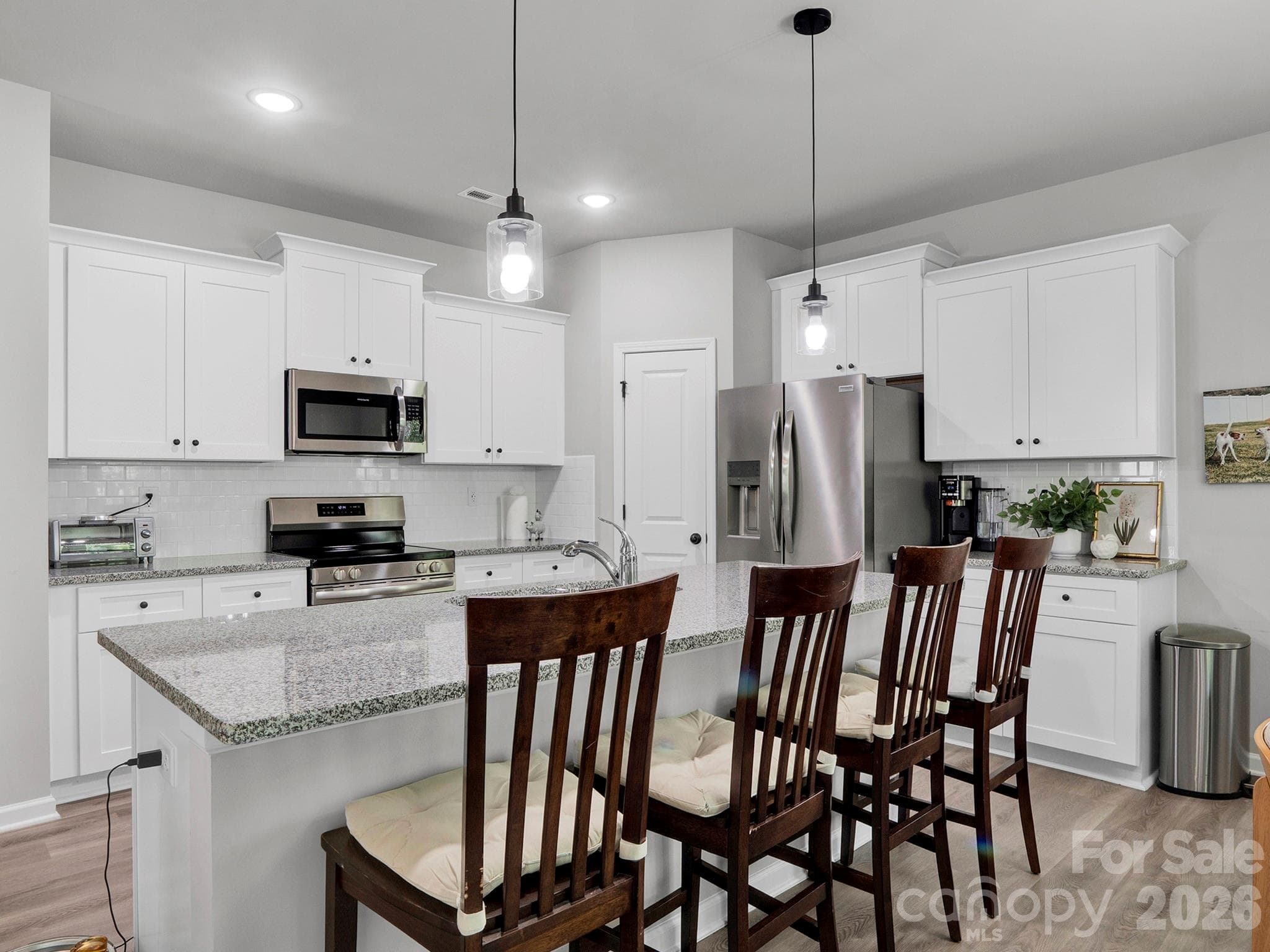 Large Kitchen with cabinets and pantry. - 7203 Stoney Wood Lane, Charlotte