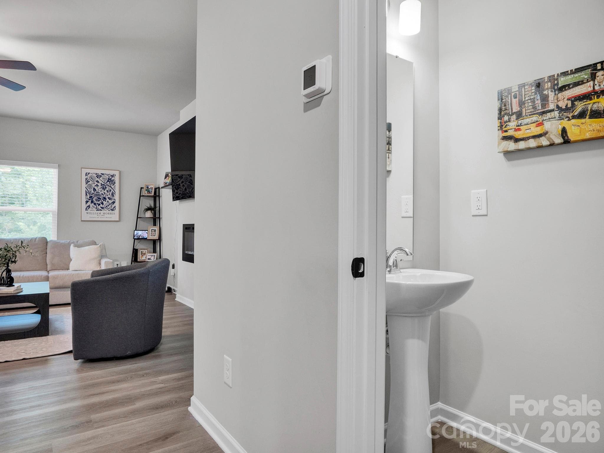 Half bath on the main floor. - 7203 Stoney Wood Lane, Charlotte