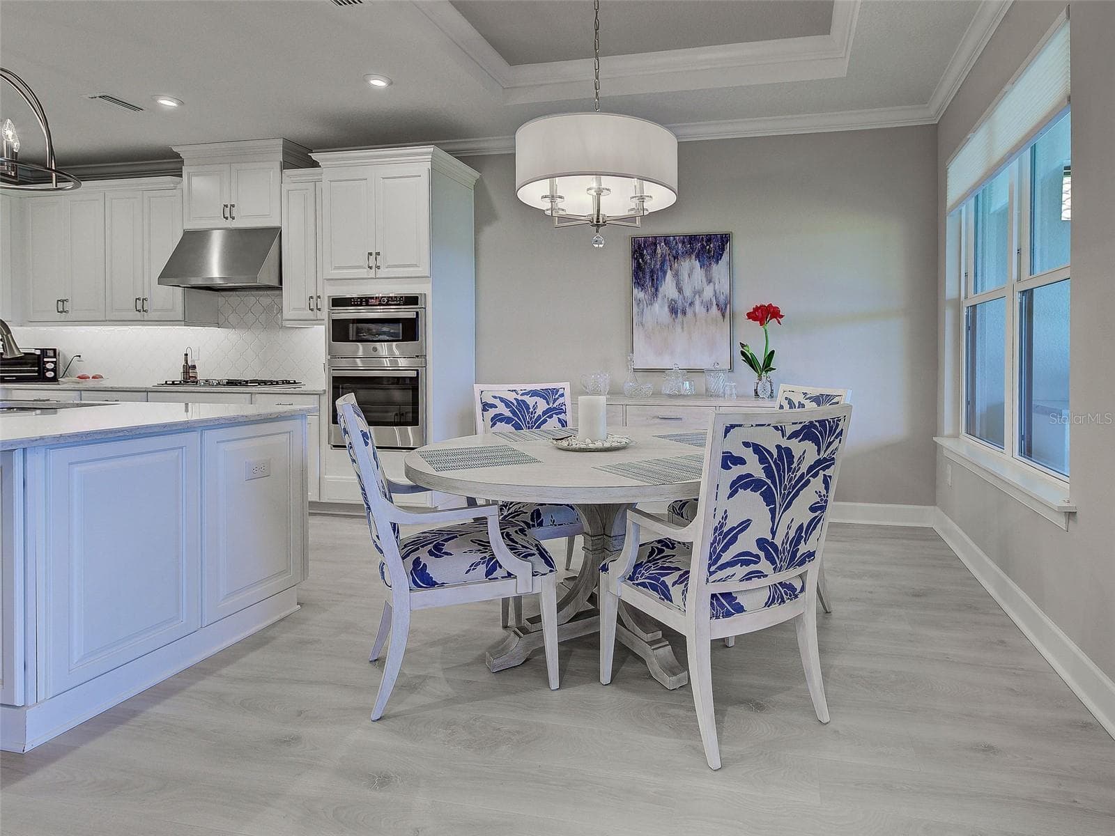 The dining area is adjacent to the kitchen which is perfect for cooking and entertaining. - 5616 SCARLOTTI ST, NOKOMIS