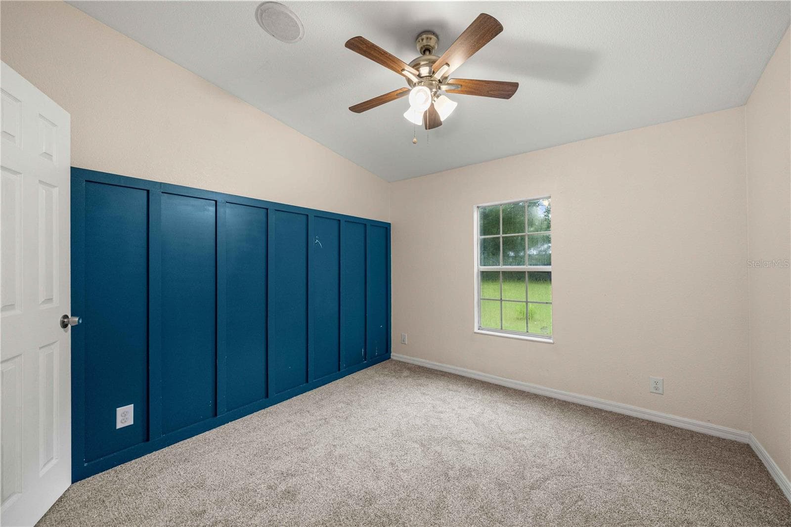 secondary bedroom off the living room hall and laundry entrance - 13250 NW 160TH AVE, MORRISTON