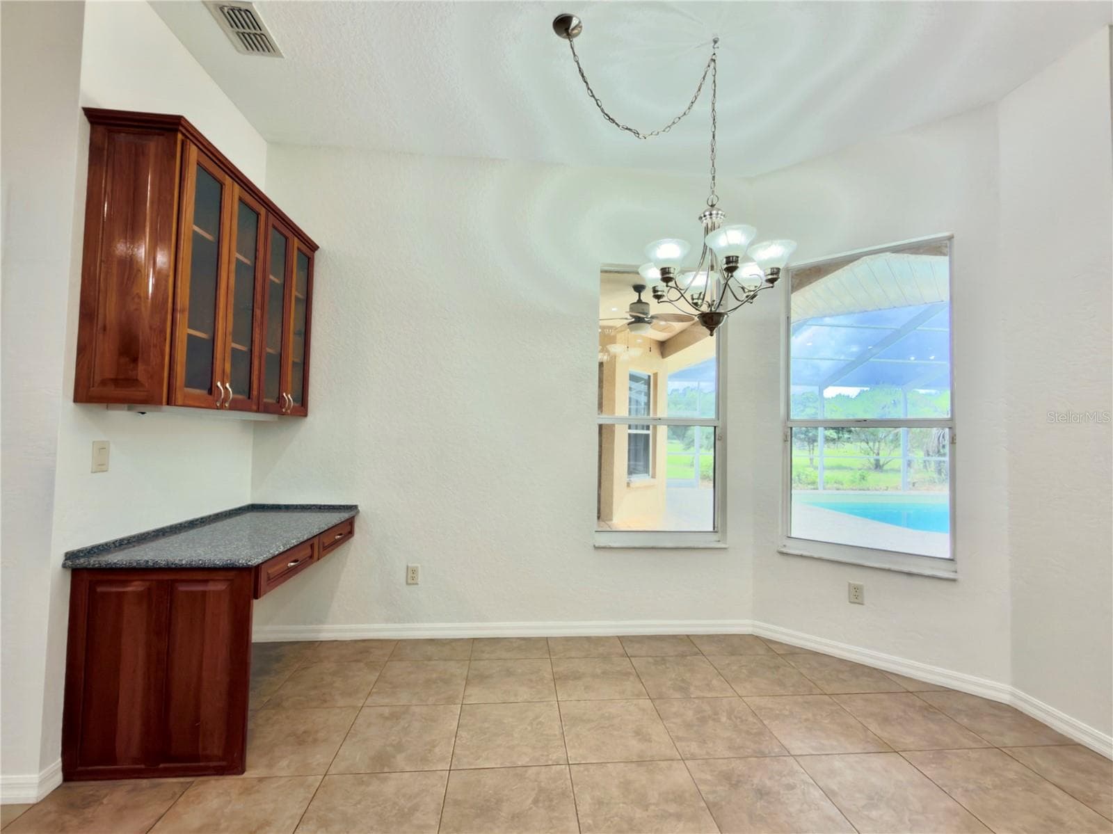 Nook and kitchen desk - 24087 TWISTER LN, BROOKSVILLE