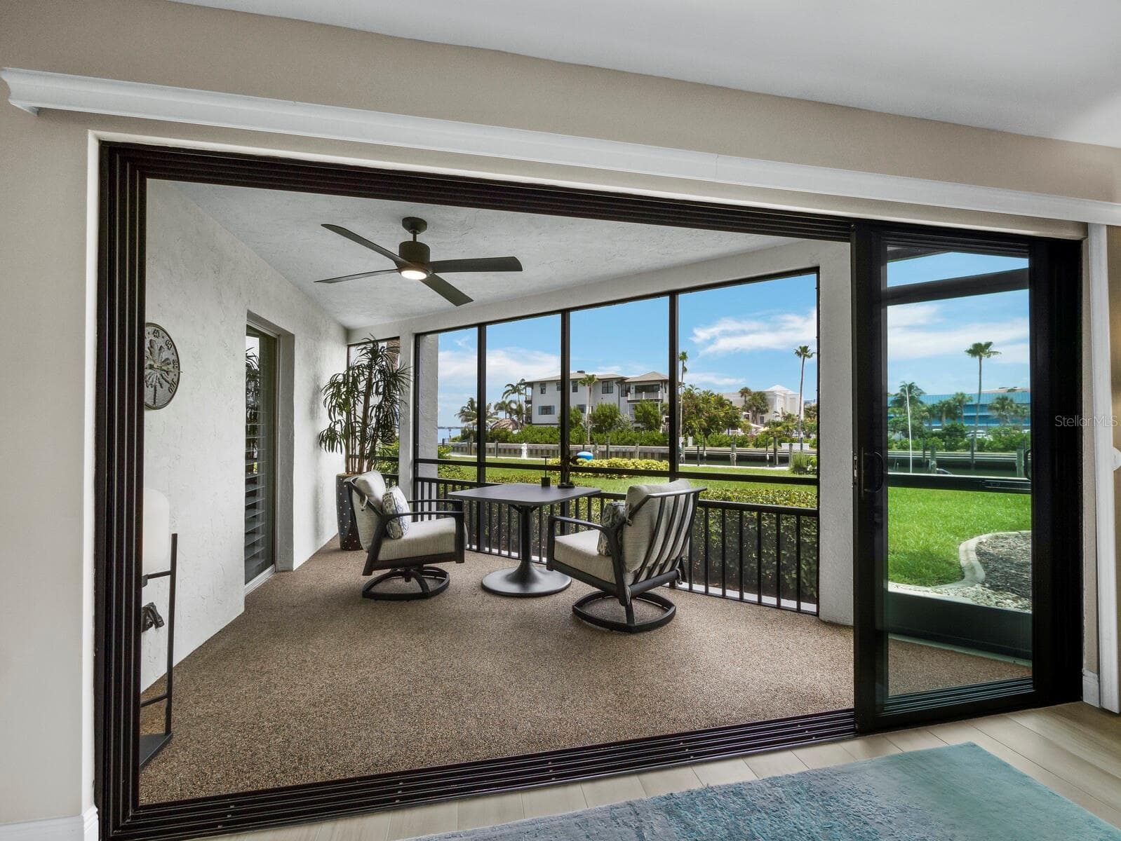 Morning coffee or evening cocktails on the lanai - 448 GULF OF MEXICO DR #A104, LONGBOAT KEY