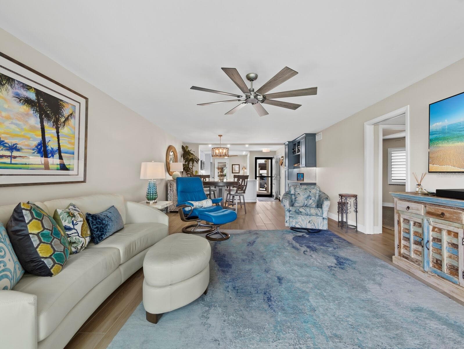 Looking back from the living room through the dining area to the custom kitchen...Bosch appliances! - 448 GULF OF MEXICO DR #A104, LONGBOAT KEY