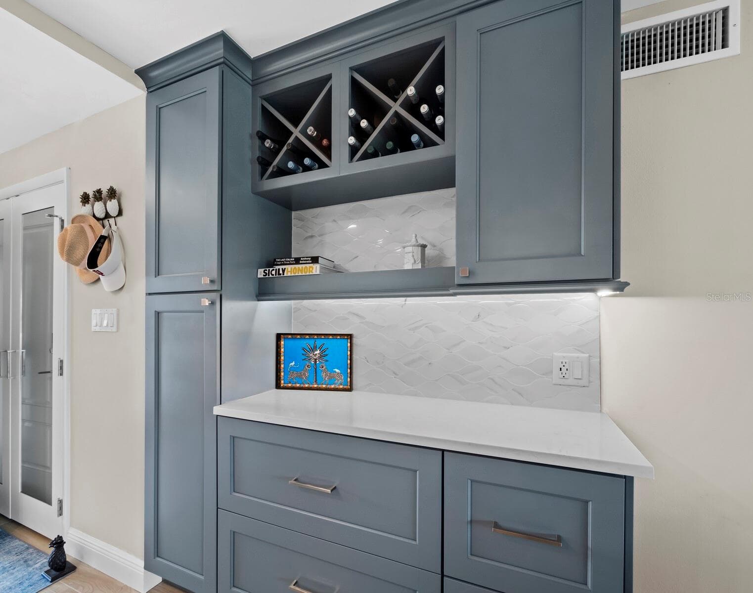 Custom cabinetry; dry bar and pantry...all for convenience! - 448 GULF OF MEXICO DR #A104, LONGBOAT KEY