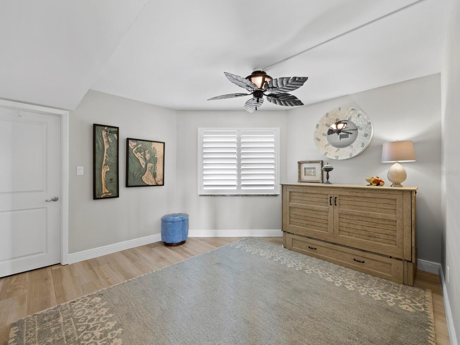 Bedroom #2 with walk in closet. Shown with a murphy bed. - 448 GULF OF MEXICO DR #A104, LONGBOAT KEY