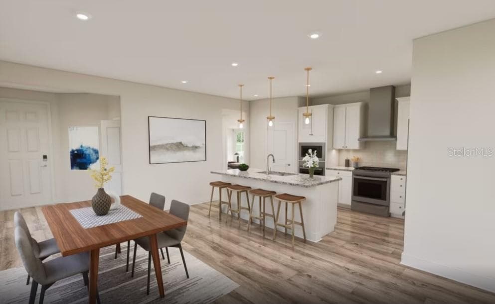 Photos are of furnished Flagstone model. Homes may vary. - 4782 W BLUE STAR CT, NORTH PORT