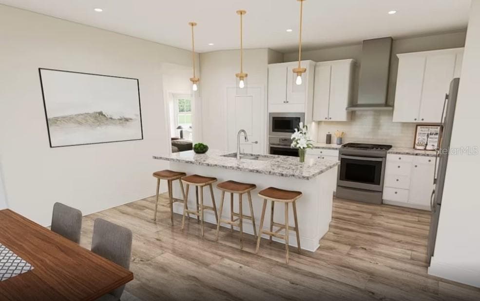 Photos are of furnished Flagstone model. Homes may vary. - 4782 W BLUE STAR CT, NORTH PORT