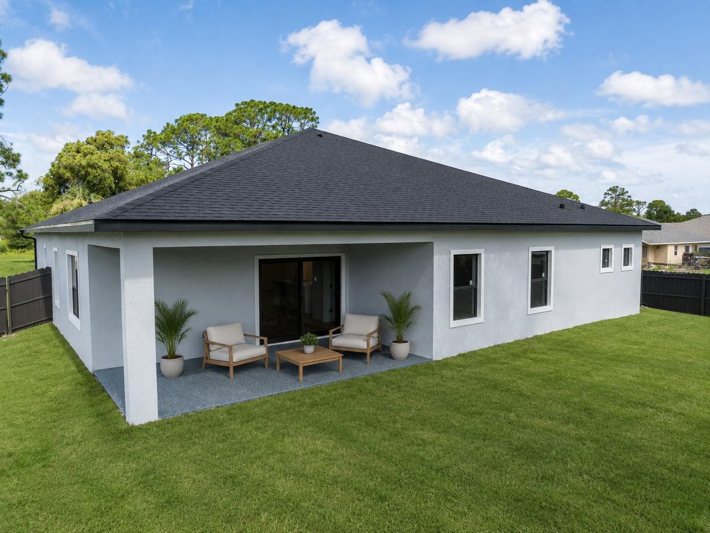 Virtually Staged Rear Patio Area & Fence Yard - 1274 RONALD ST, NORTH PORT