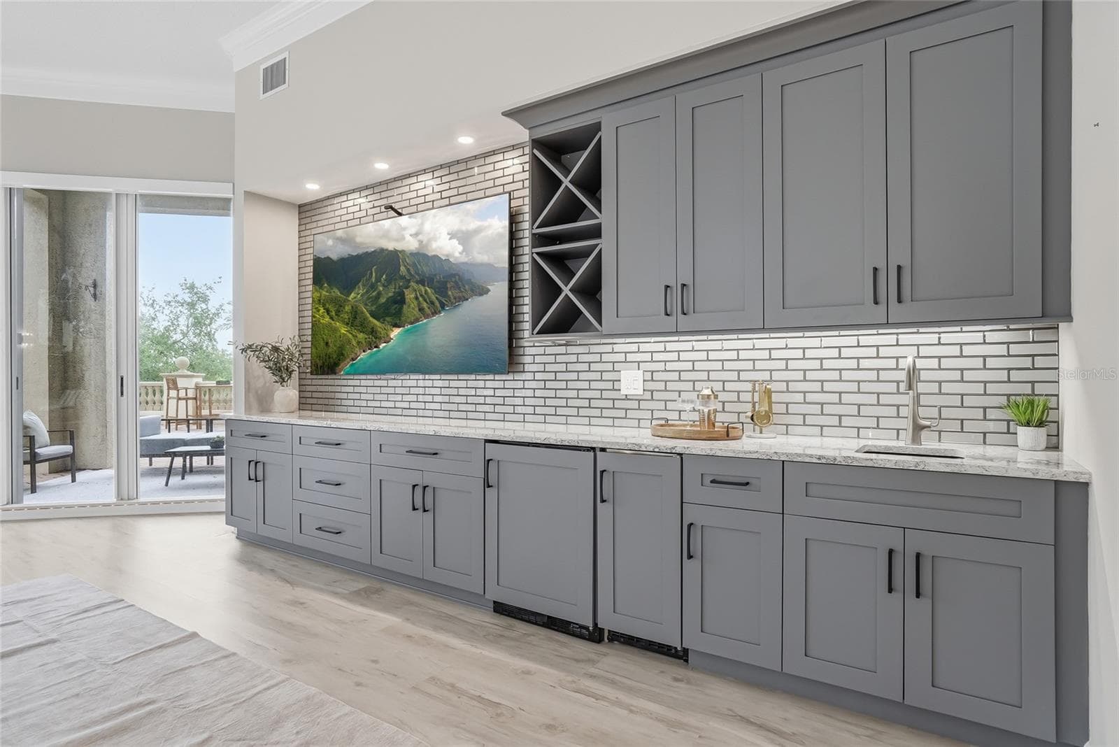 Custom media wall with wet bar, wine storage, and ice maker. - 100 BEACH DR NE #301, ST PETERSBURG
