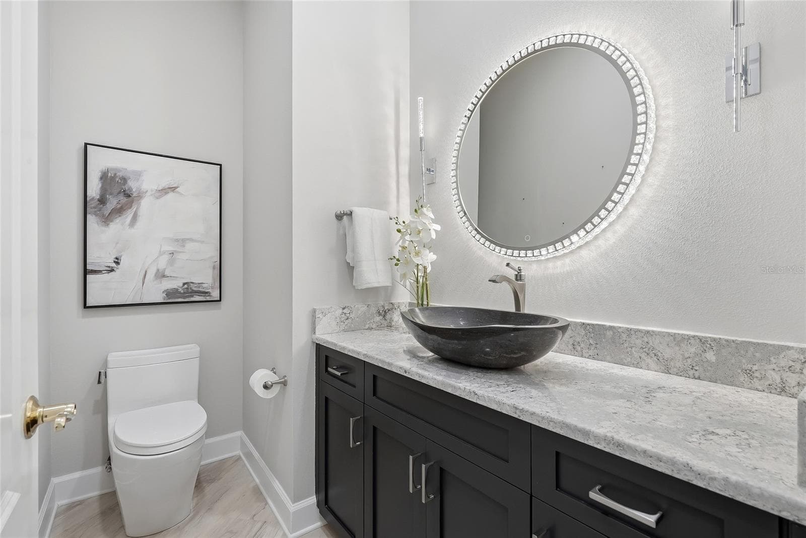 half bathroom outside of the office - 100 BEACH DR NE #301, ST PETERSBURG