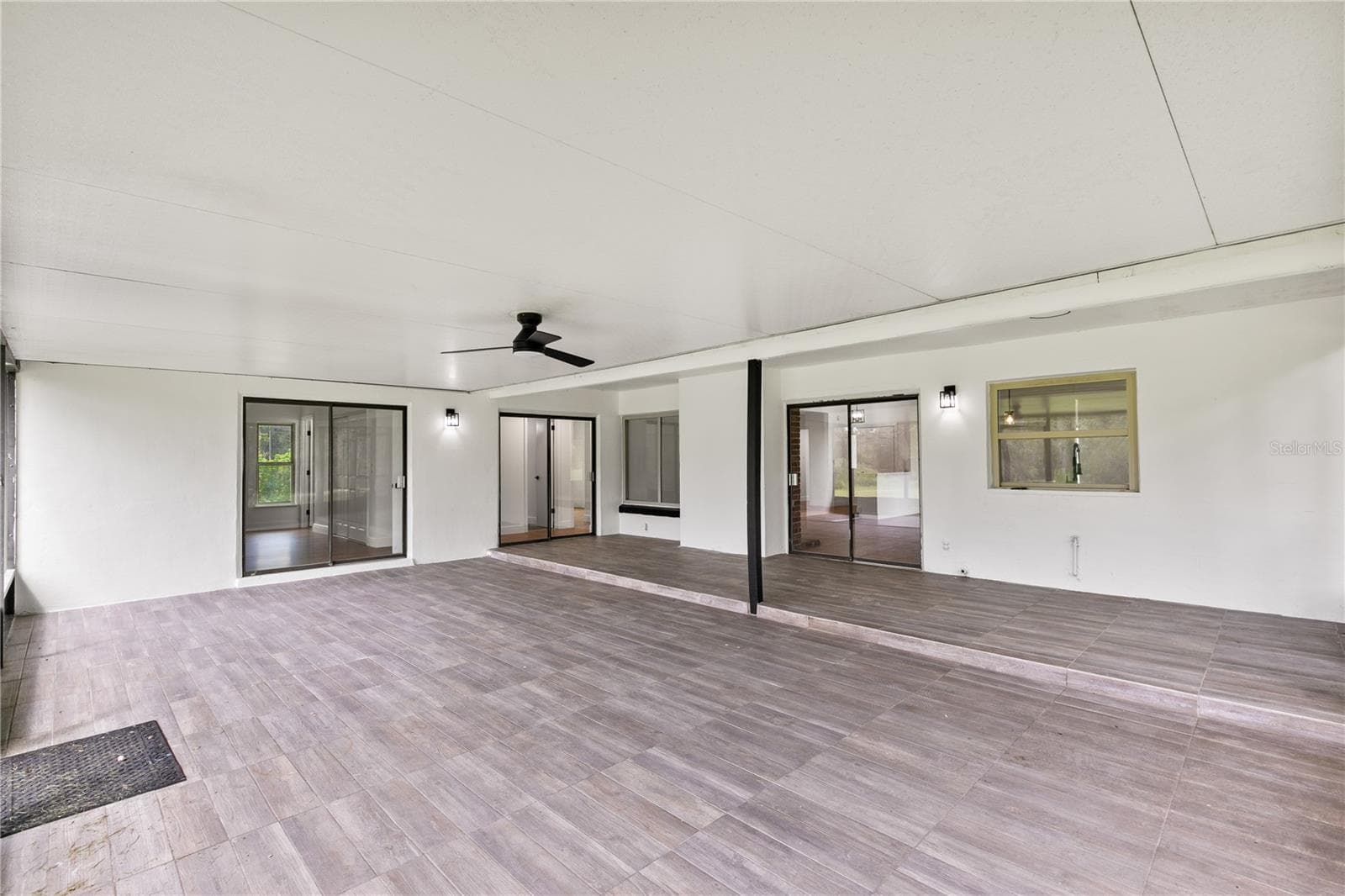Back patio - 714 DIVOT LN, POINCIANA