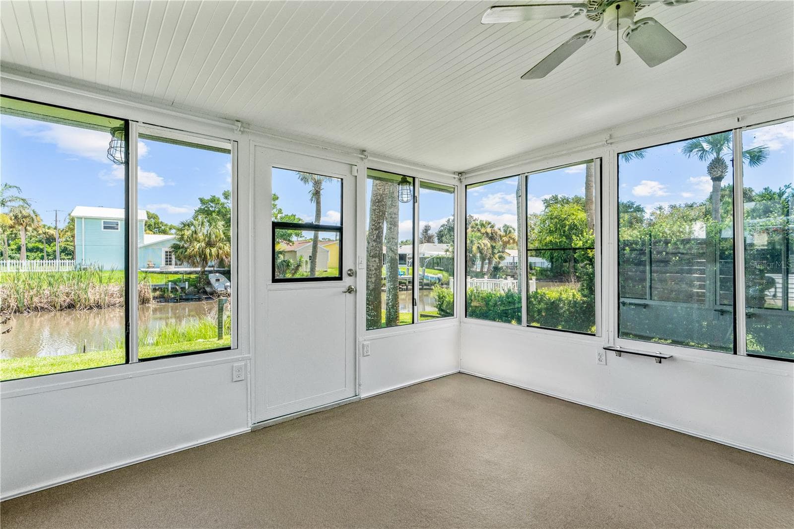 back enclosed porch - 762 PINE SHORES CIR, NEW SMYRNA BEACH