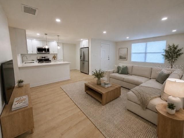 Furniture  and refrigerator and stove virtually staged - 4533 W FERN ST, TAMPA