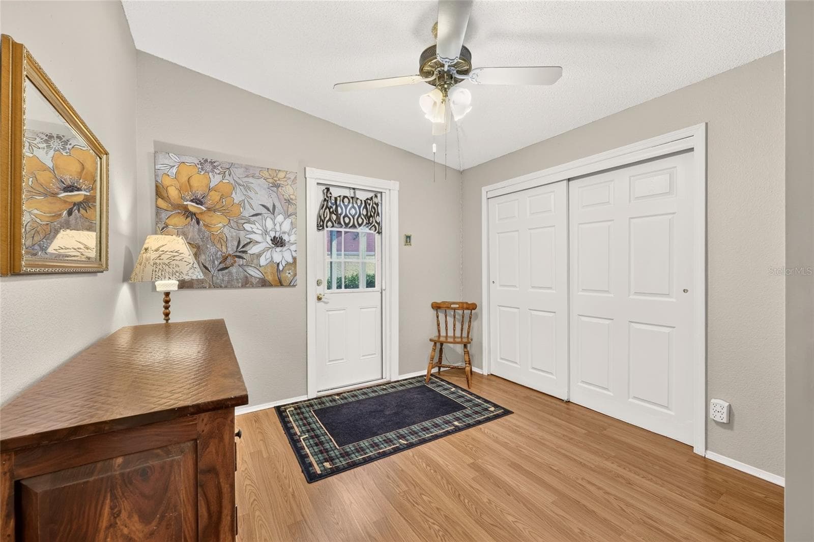 Guest Bedroom with Door to Rear Patio - 1215 PANAMA PL, THE VILLAGES