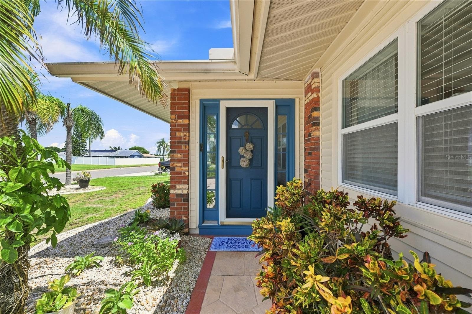 Lovely & Welcoming Front Entrance, Home is Immaculate & Well Maintained - 1405 HACIENDA DR, SUN CITY CENTER