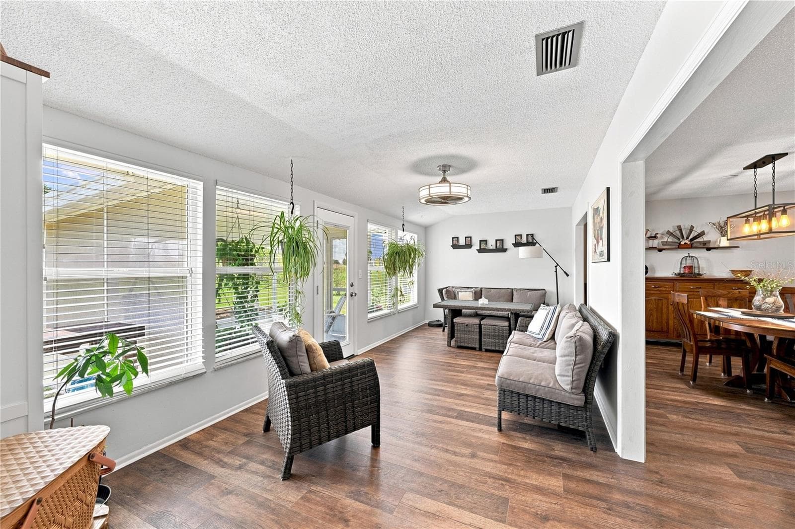 Enclosed Lanai/Florida Beautiful Laminate Oak Plank Flooring - 1405 HACIENDA DR, SUN CITY CENTER