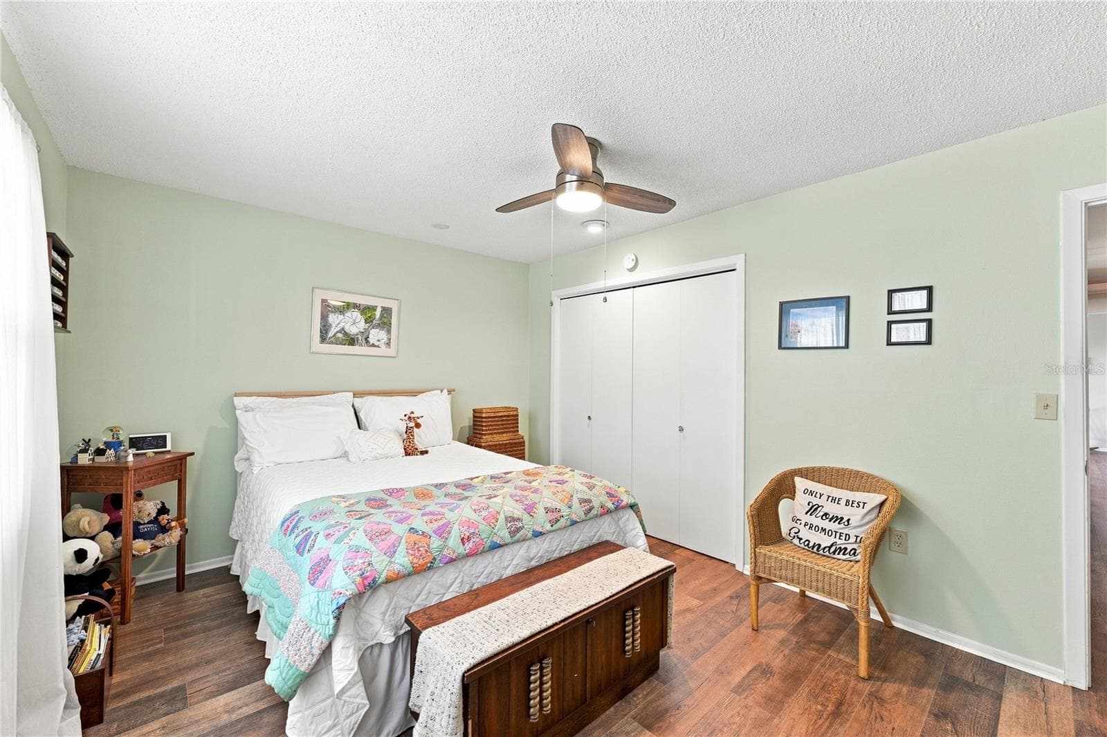 Spacious & Inviting Front Guest Room, Beautiful Laminate Oak Plank Flooring, Additional Closet Space, New Modern Fan - 1405 HACIENDA DR, SUN CITY CENTER
