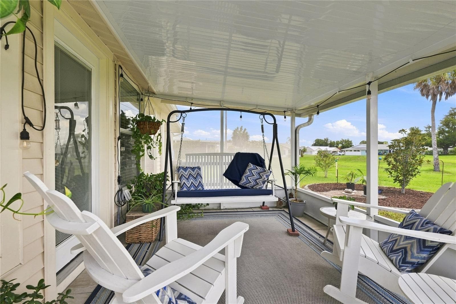 Inviting & Cozy, Perfect for Enjoying Evening Breezes & Your Favorite Beverage - 1405 HACIENDA DR, SUN CITY CENTER