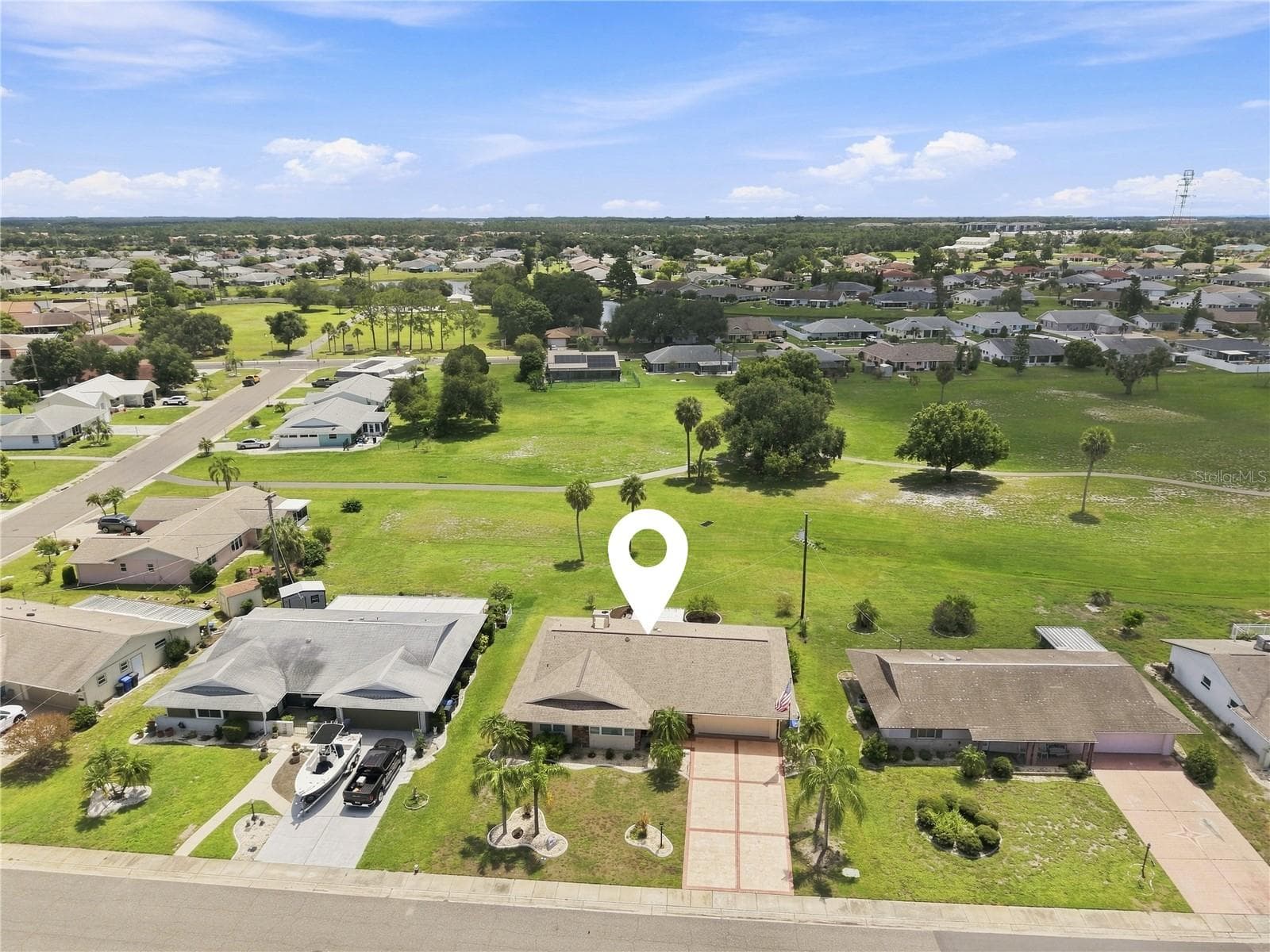 Low Aerial, Newer Roof 2022, Open Green Space - 1405 HACIENDA DR, SUN CITY CENTER