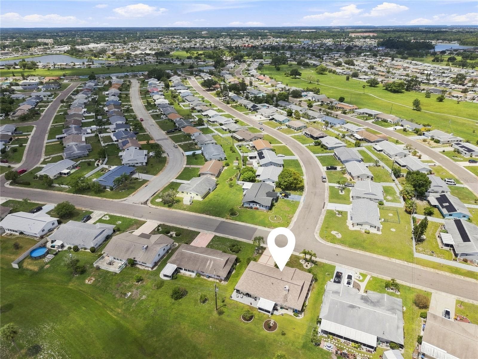Aerial, Screened Lanai & Large Patio Great for Enjoying Outdoor Florida Living - 1405 HACIENDA DR, SUN CITY CENTER