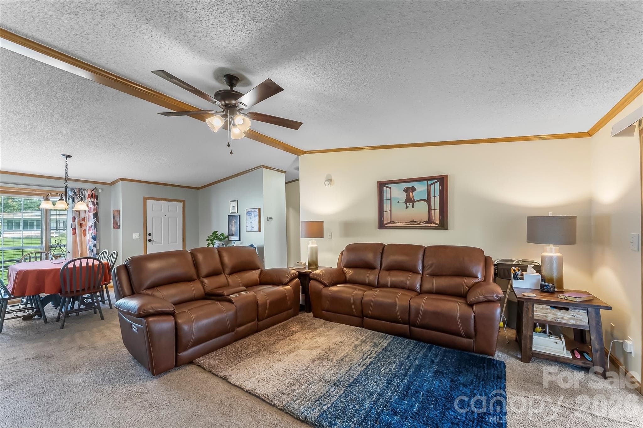 Open living room and dining room - 208 Red Birch Court, Hendersonville