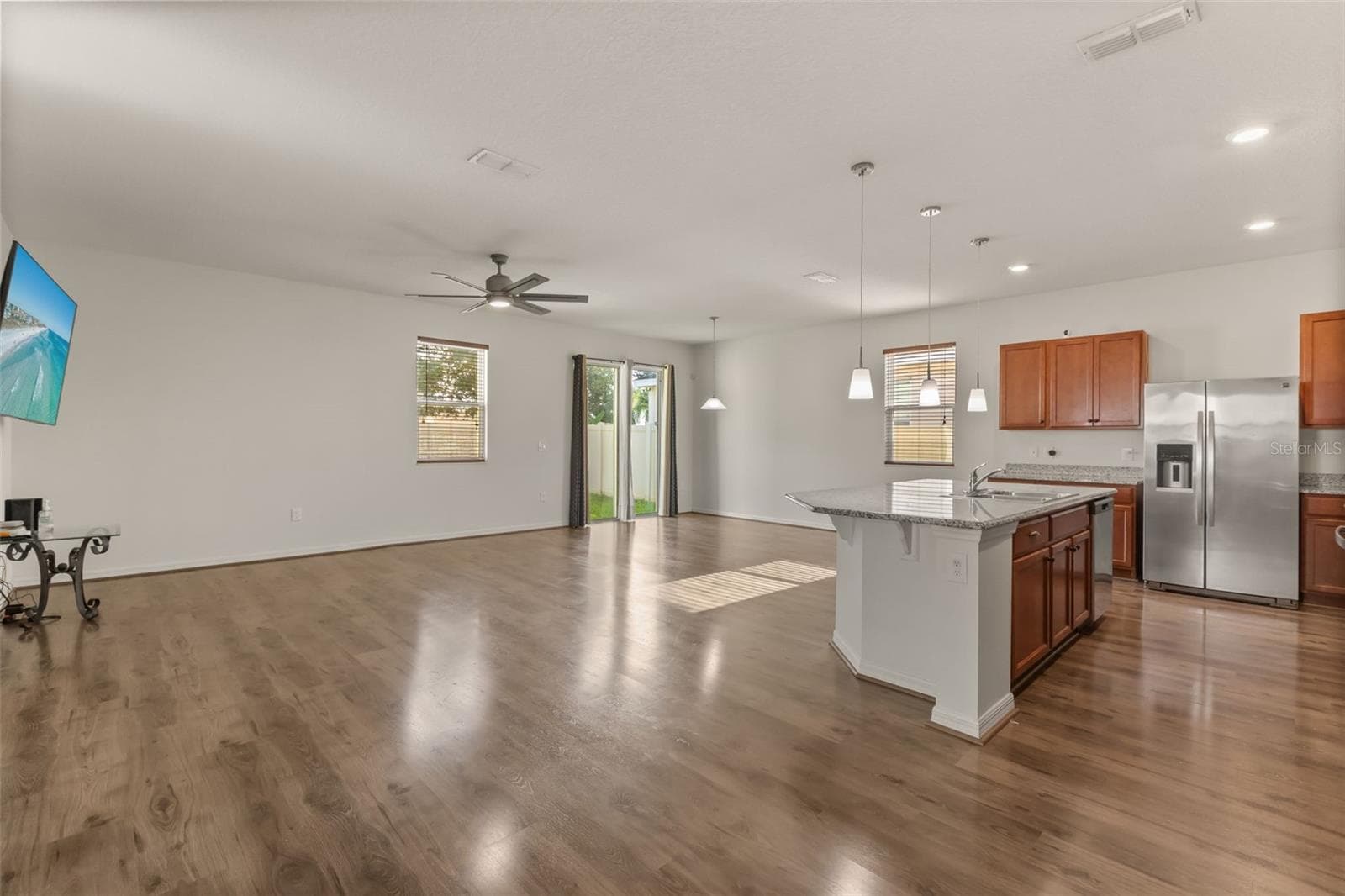 Open Floorplan: Kitchen, Living Room, and Dining Room - 12025 SUMTER DR, ORLANDO