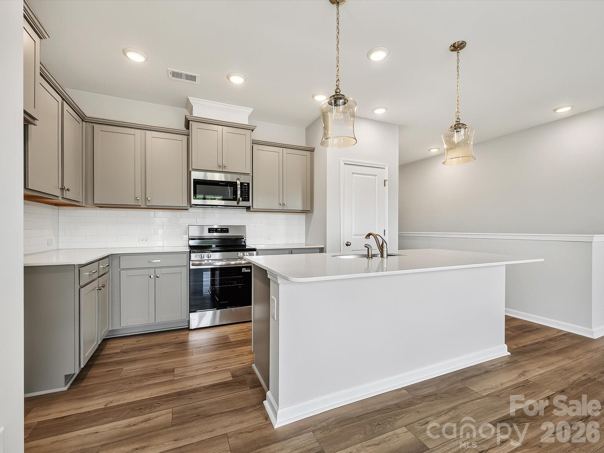 Upgraded cabinets with Crown Molding and Soft Close Doors - Charlotte