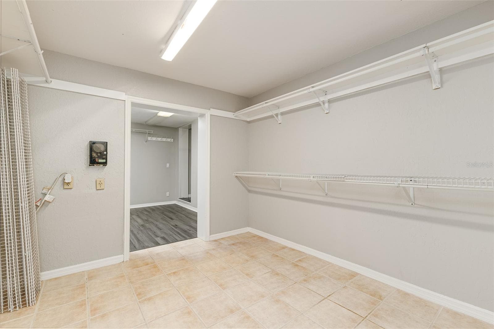 Primary closet - 2925 E LAKE HARTRIDGE DR, WINTER HAVEN