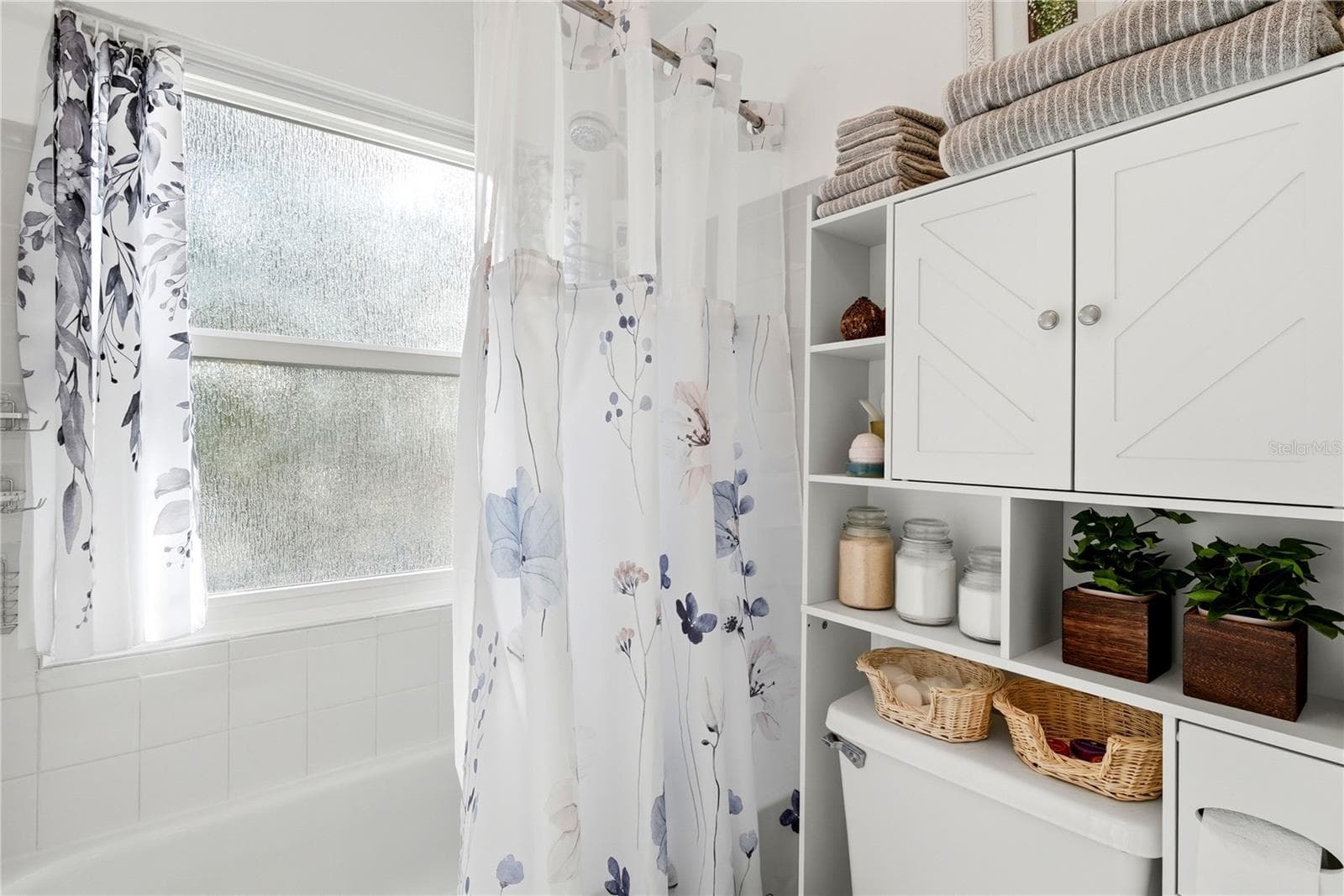 Bathroom with Tub. Door Separates Dual Sink Area. Making Getting Ready for Work Easy! - 2400 FEATHER SOUND DR #427, CLEARWATER