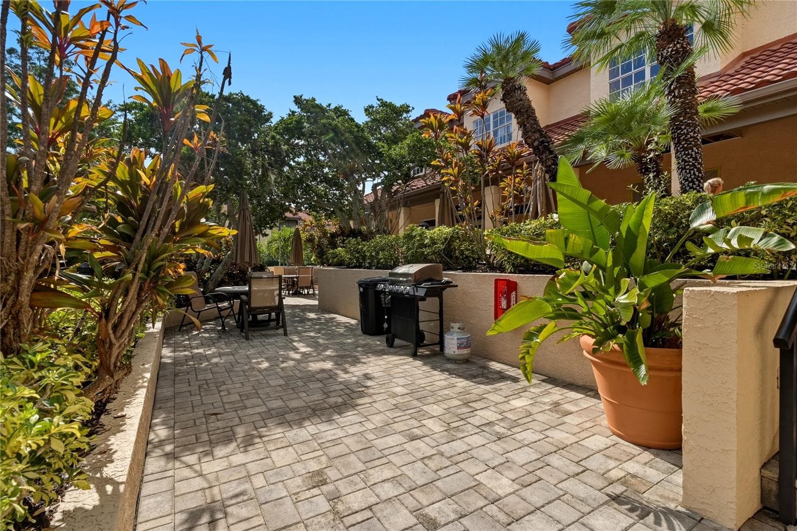Grills by the Pool and Clubhouse Area. - 2400 FEATHER SOUND DR #427, CLEARWATER