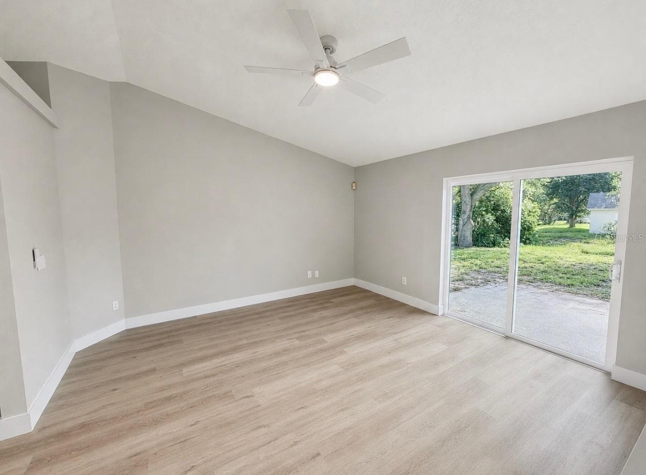 Living Room with slider doors that lead to patio and enormous back yard - 10814 CRESCENDO LOOP, CLERMONT